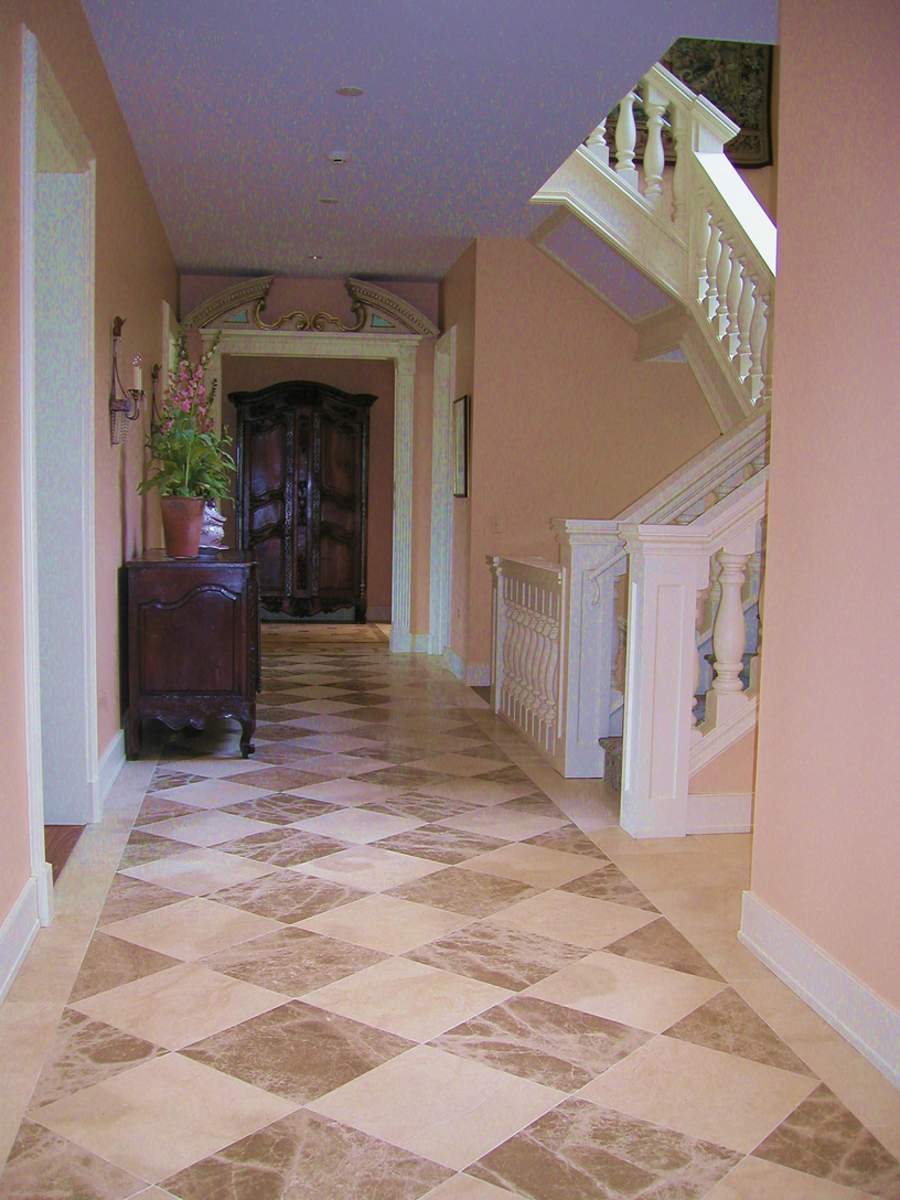 Center hallway has large stair well to second floor. 
