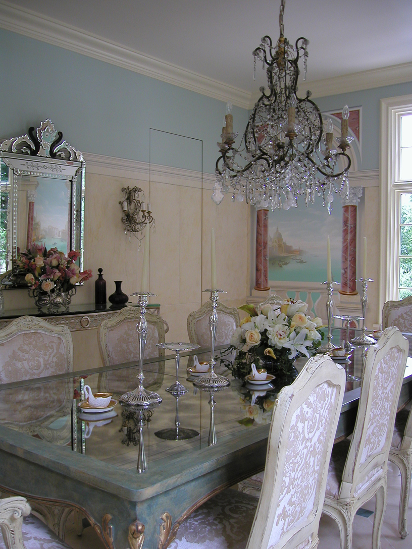 Dining room with custom murals of Venice, custom mirror top dining table. 